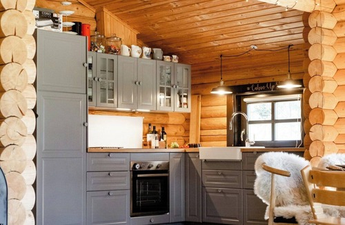 Fjerritslev House | Authentic log house amid evergreens in Vendsyssel
