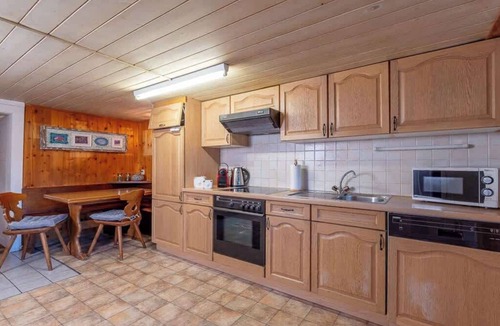 Kandergrund Cabin | Authentic Swiss Farm Stay in the Alps | Fireplace