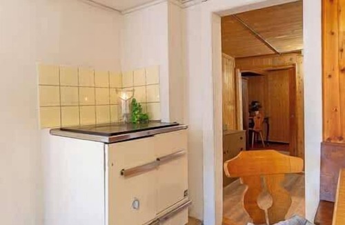 Kandergrund Cabin | Authentic Swiss Farm Stay in the Alps | Fireplace