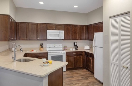 West Yellowstone Resort | Available 2-6 July 26 W. Yellowstone Gate Wordmark Resort 2 bedroom and kitchen