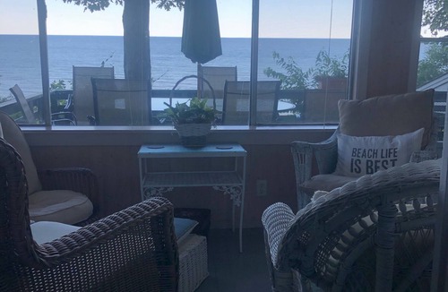 Grand Haven Cottage | Awake with the sound of the waves, lunch seeing the boats, dinner with a sunset
