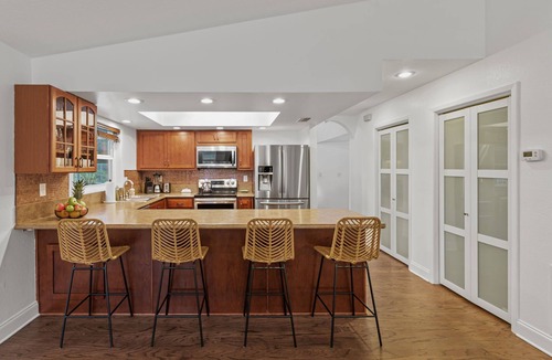 Palm Harbor House | Backyard Games, Fire Pit, Heated Pool, Near Beach