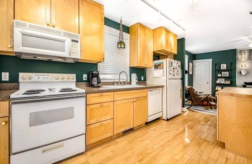 Three Oaks House | Backyard Oasis w Downtown Walkability, Fire Pit