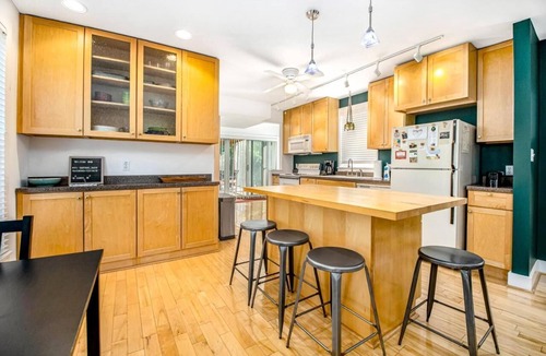 Three Oaks House | Backyard Oasis w Downtown Walkability, Fire Pit