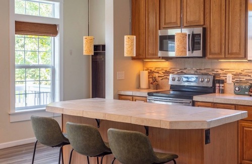 Mossyrock House | Backyard with hot tub and fire pit!