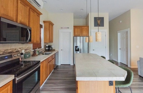 Mossyrock House | Backyard with hot tub and fire pit!