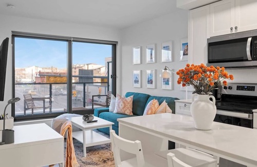 Crescent Heights Apartment | "Baja Blast" 2BR |Mins to Stampede | Rooftop Patio