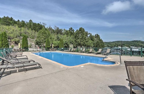 Camdenton Apartment | Balcony and Seasonal Pool Lakefront Ozark Condo