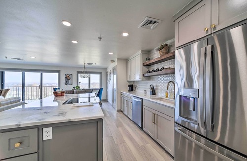 Afton Condo | Balcony & Lake View: Modern Condo in Monkey Island