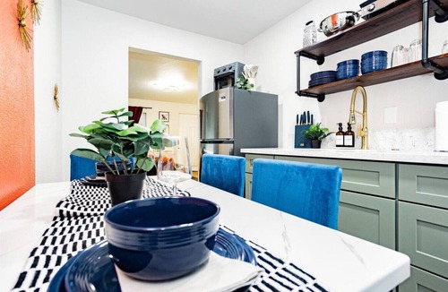Gateway District House | Balcony Strip-View Suite | Workspace & Games