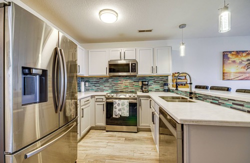 Osage Beach Apartment | Balcony w/Marina Views: Lake Ozark Hideaway!