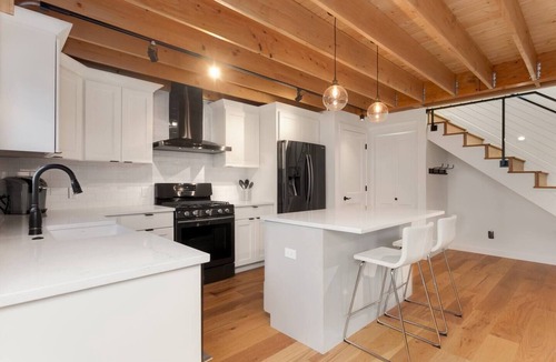 Ballard House | Ballard Locks & Market St | Fire Pit Courtyard · Chef's Kitchen | Designer Loft