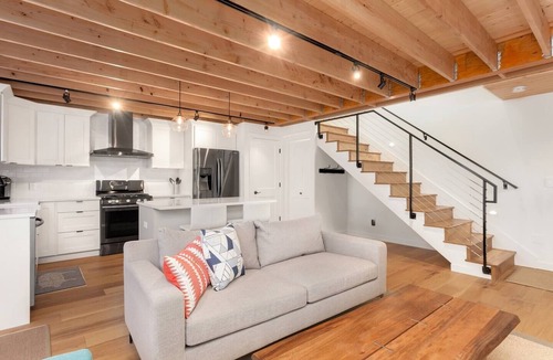 Ballard House | Ballard Locks & Market St | Fire Pit Courtyard · Chef's Kitchen | Designer Loft