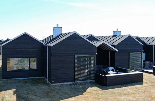 Oster Hurup House | Balmy Holiday Home in Hadsund with Whirlpool