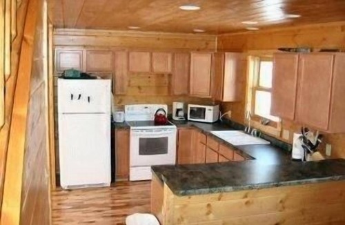 Land O Lakes Ski Chalet | Bargain fall/winter/spring rates. Lakefront privacy & campfire pit.