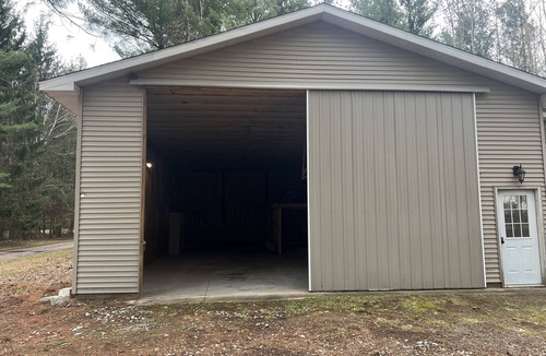 Linwood House | Barn House with Inside Boat Parking