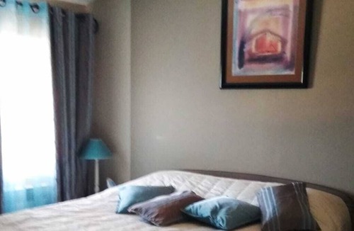 Montcabrier House | Barn standing between greenery and sunflowers completely independent.