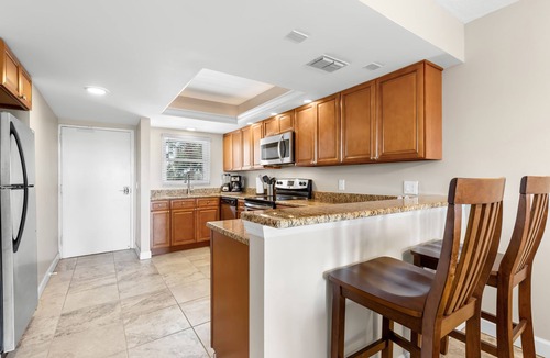 Indian Shores Condo | BAY SHORES YACHT AND TENNIS CLUB 207 RENOVATED AND ACROSS THE STREET FROM BEACH