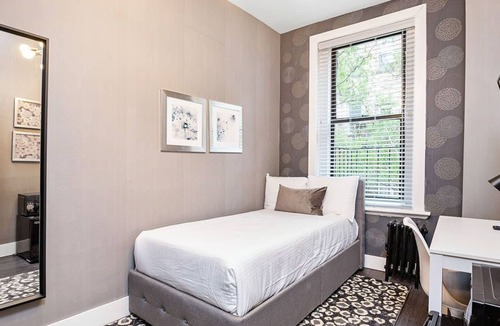 Bay Village House | Bay Village Suites