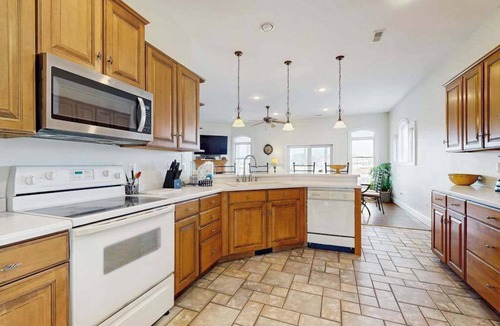 Heron Harbour Isle House | Bayfront home with WiFi, fireplace, & pool