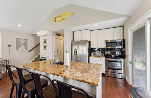 Town Bank House | Bayside Heated Salt Water Pool & Hot Tub Oasis
