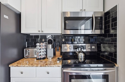 Town Bank House | Bayside Heated Salt Water Pool & Hot Tub Oasis