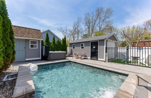 Town Bank House | Bayside Heated Salt Water Pool & Hot Tub Oasis