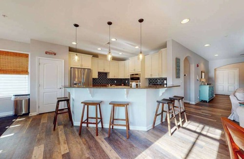 Sun Ridge Condo | Bayside Resort condo - fireplace, central AC & private W/D - pools, gym & golf
