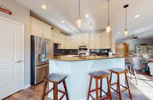 Sun Ridge Condo | Bayside Resort condo - fireplace, central AC & private W/D - pools, gym & golf