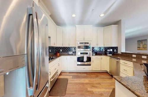 Sun Ridge Condo | Bayside Resort condo - fireplace, central AC & private W/D - pools, gym & golf