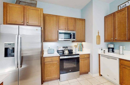 The Commons Condo | Bayside Resort dog-friendly townhouse w/tennis court access, WiFi, and balcony