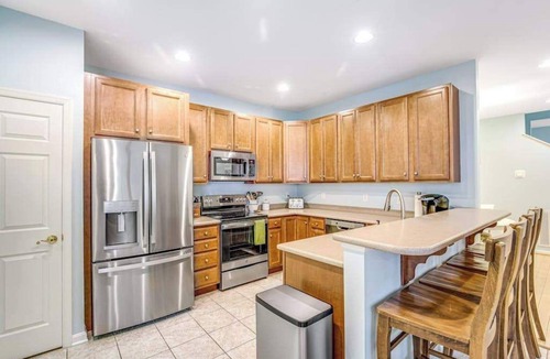 Sun Ridge Condo | Bayside Resort townhouse with golf on-site, pool access, fireplace, & central AC