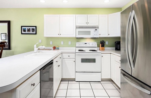 Heron Harbour Isle Condo | Baywatch III B201 - pretty 3 bedroom on canal with outdoor pool.
