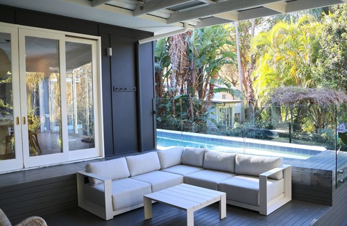 Avalon Beach House | Beach bungalow with a pool.