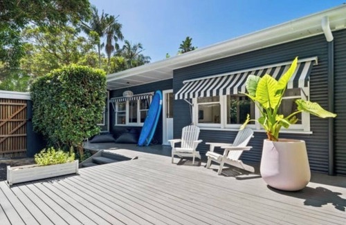 Avalon Beach House | Beach bungalow with a pool.