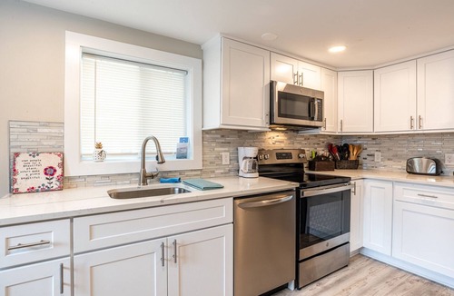 Fairfield House | Beach cottage steps from the sand and surf!