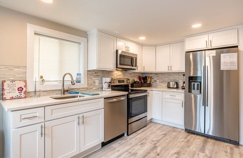 Fairfield House | Beach cottage steps from the sand and surf!