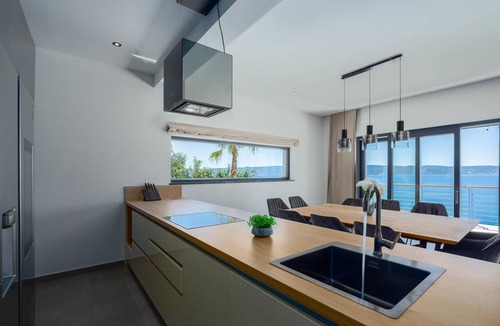 Jesenice House | Beach front home in Jesenice with sauna