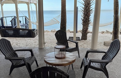 Spring Hill House | Beach front! Step off the last stair and into the Gulf!