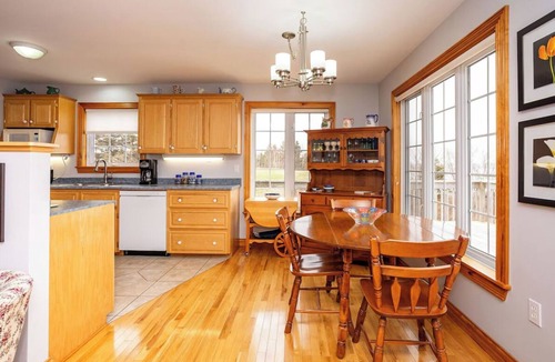 Anglo Rustico House | Beach Hill Cottage—Waterview PEI Retreat with Wraparound Deck & Family-Friendly