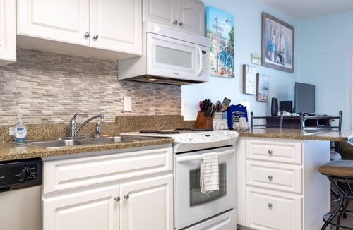 Bradenton Beach Condo | Beach House 2 Beach Front Panoramic Sunset Views Screened Lanai