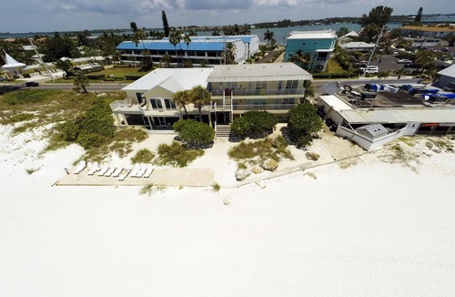 Bradenton Beach Condo | Beach House 2 Beach Front Panoramic Sunset Views Screened Lanai