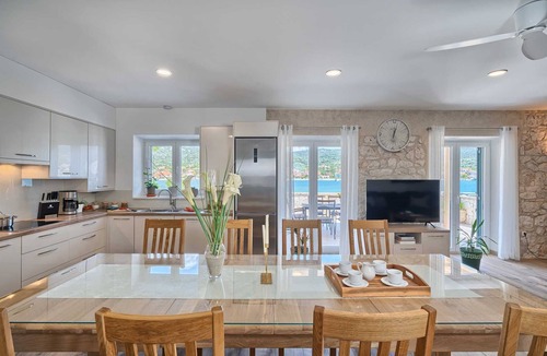 Vinisce Villa | Beach House Joy - charming waterfront villa with a heated pool for 8 guests by MyWaycation