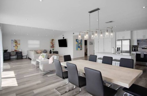 Bay Esplanade House | Beach House on the water with dock, pool & everything to enjoy the beach life.