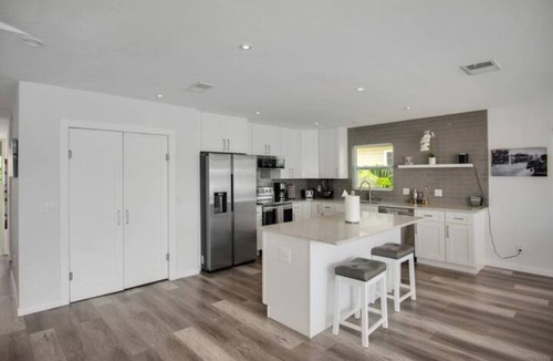 Bay Esplanade House | Beach House on the water with dock, pool & everything to enjoy the beach life.