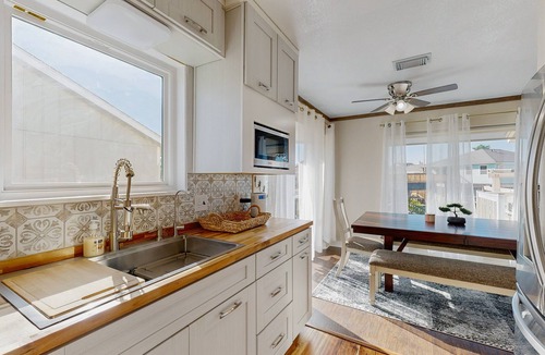 La Marque House | Beach house with private ping-pong and foosball table, patio and water view