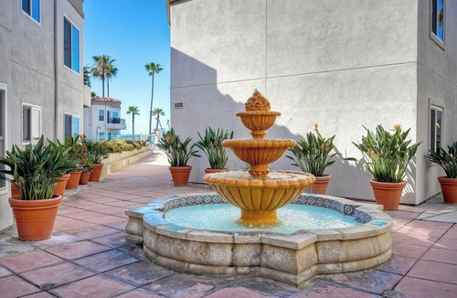 Townsite Condo | Beach View Steps to Sand, BBQ and Community Jacuzzi