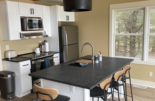 Baldwin House | Beachfront 2 Bed/1 Bath on Big Star Lake w/dock access and pristine beach.