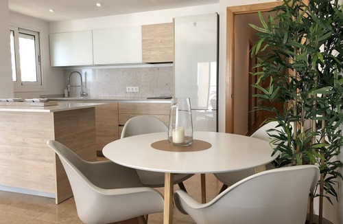 Calpe City Center Apartment | Beachfront Apartment with Sea Views, Pool, Garden & Wi-Fi