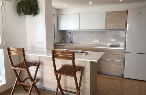Calpe City Center Apartment | Beachfront Apartment with Sea Views, Pool, Garden & Wi-Fi